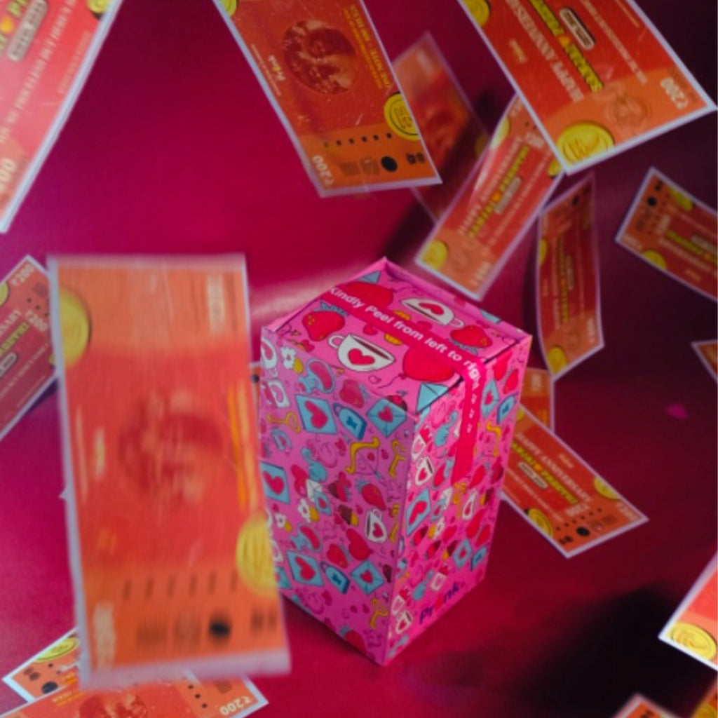 Pink box with hearts, surrounded by floating red notes on a red background. The scene conveys a festive and playful tone, filled with vibrant colors.