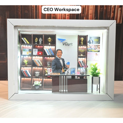 Miniature CEO office model with a smiling cardboard figure at a desk. Shelves with books, trophies, and a plant add a professional touch. Bright and cheerful.